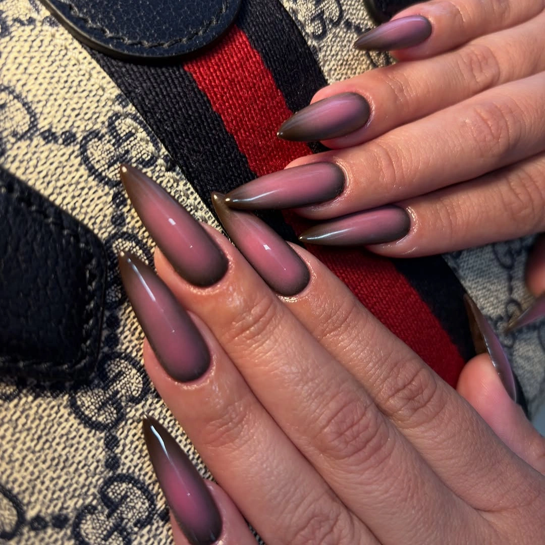 Brown square nails with orange tortoiseshell accents