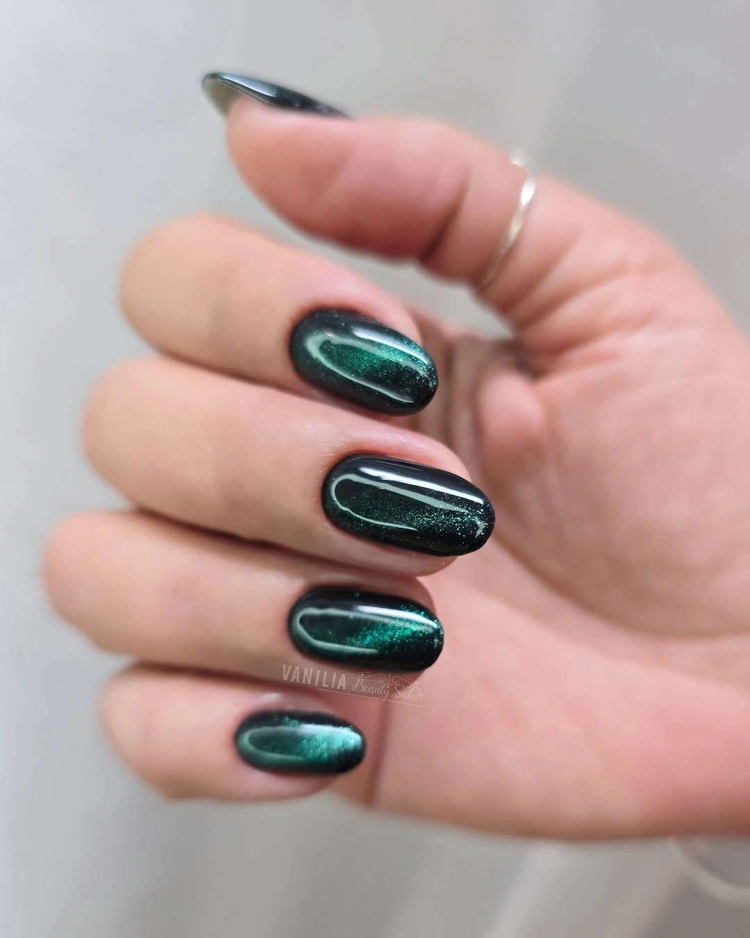 Glossy berry plum rounded nails with pale dot accents