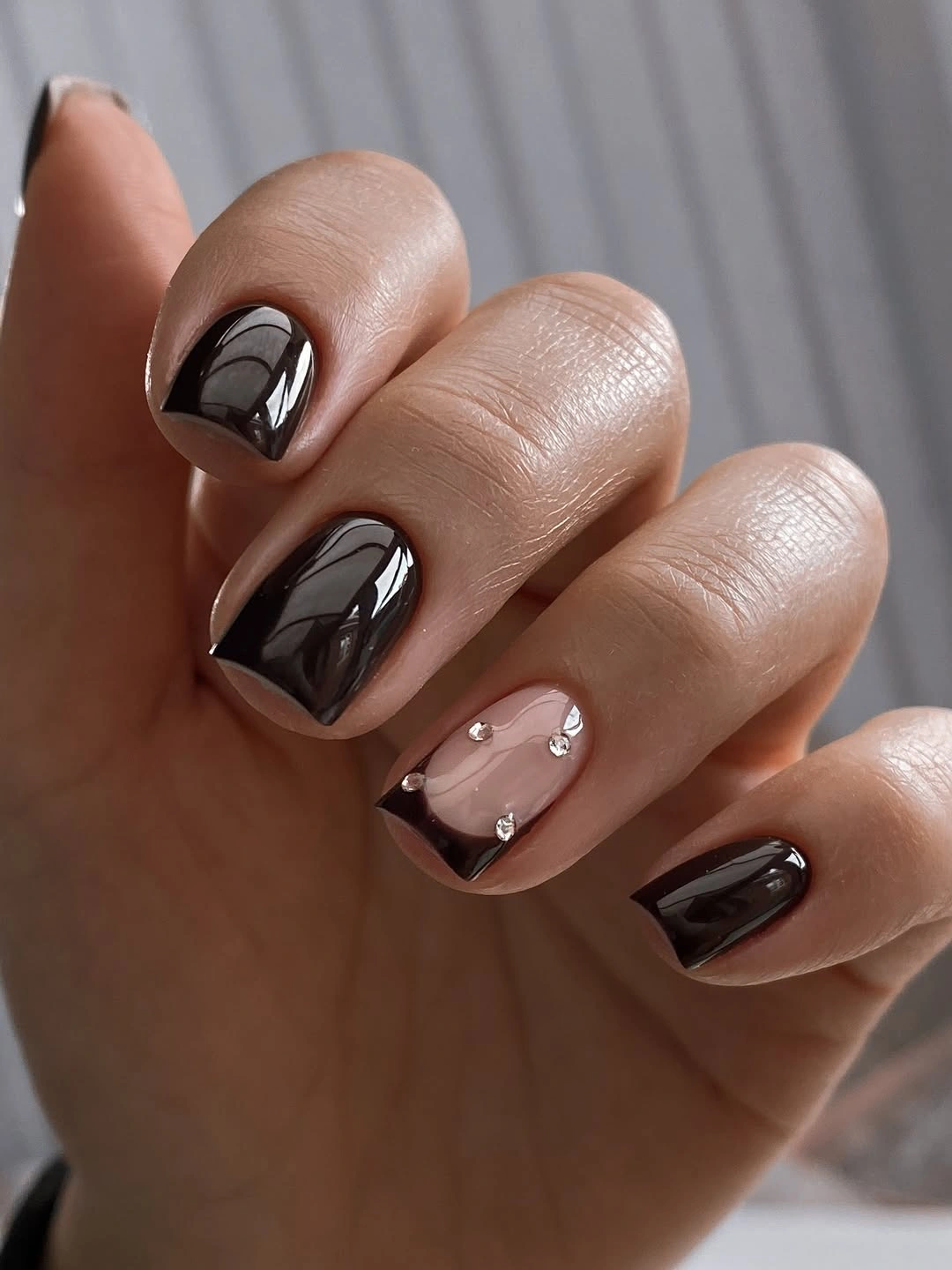 Near black brown square nails with one pale detailed accent