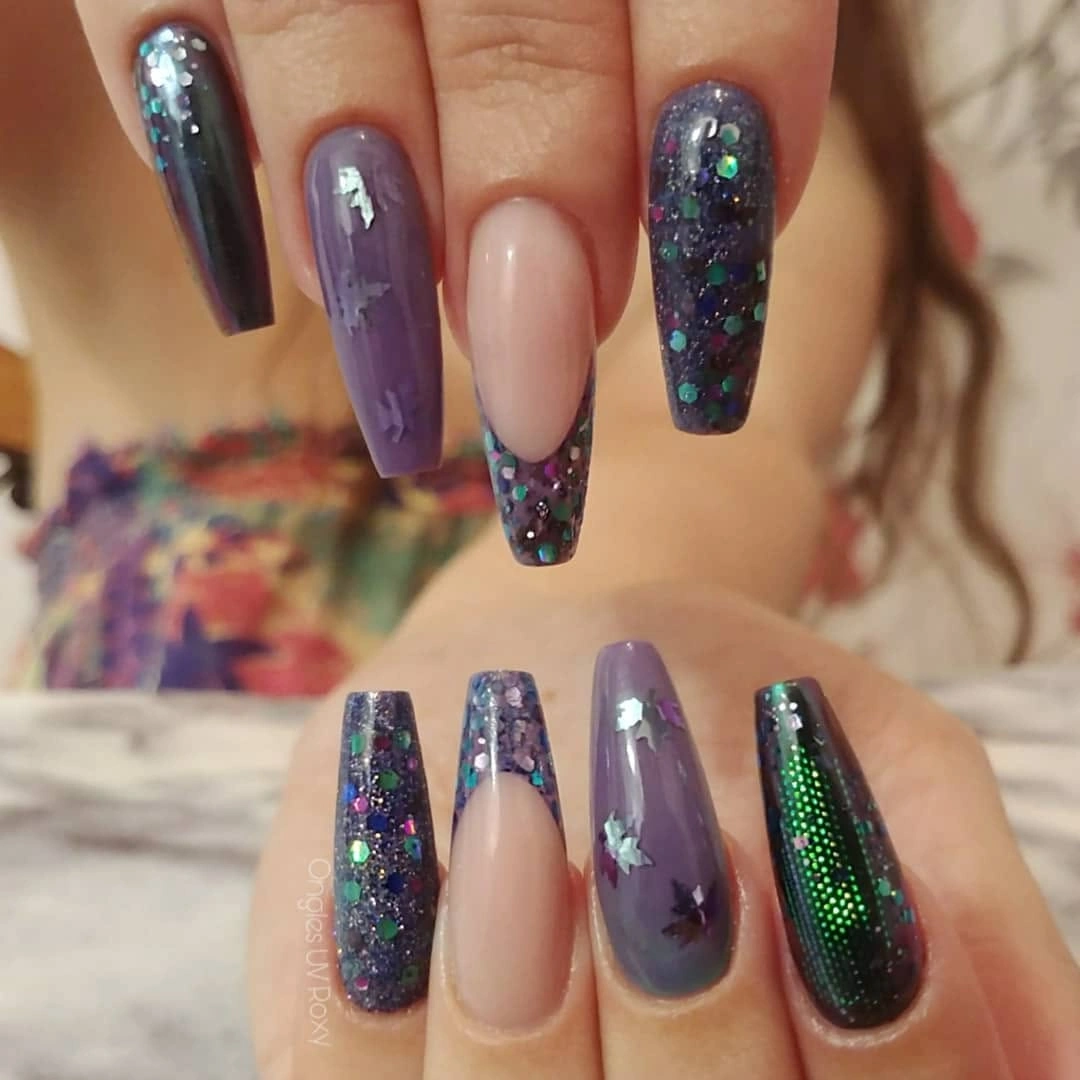 Long square nails with blue purple glitter panels and nude space