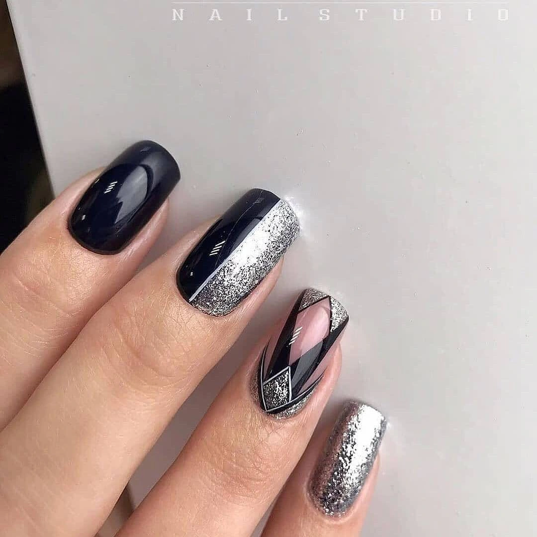 Navy silver and black square nails with geometric accents