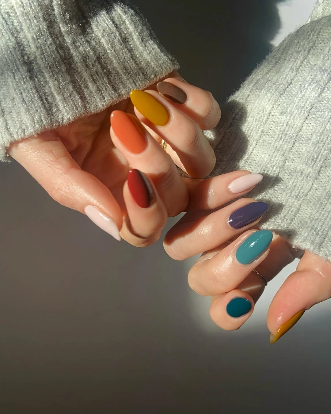 Medium oval multicolor autumn nails in glossy solids