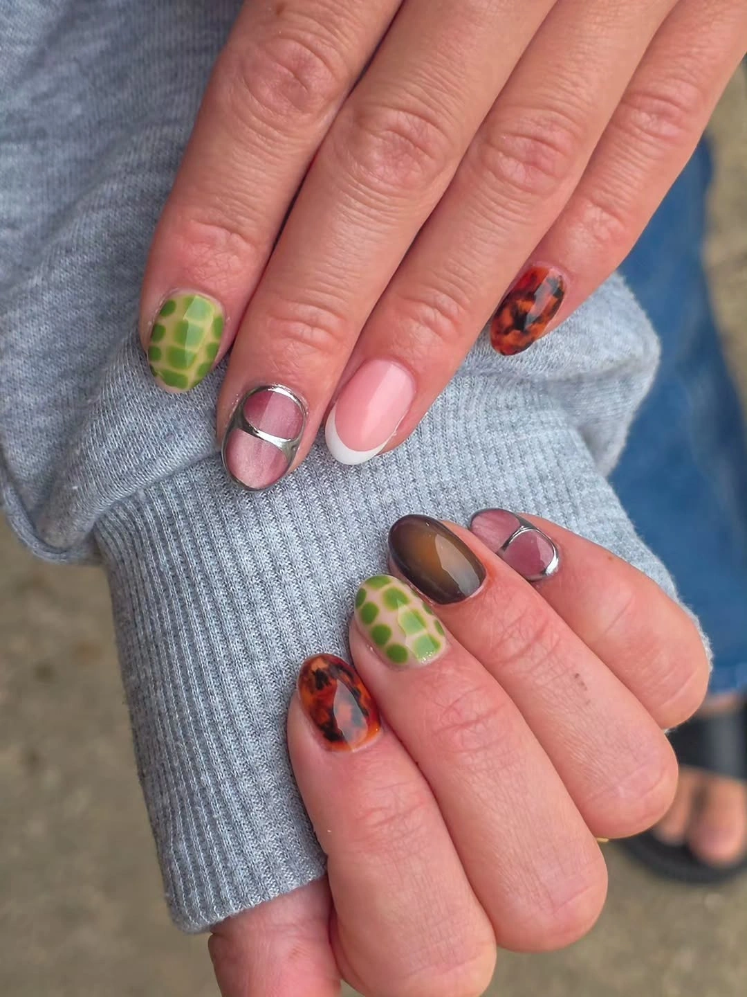 Short mixed nails with checker tortoise and French accents