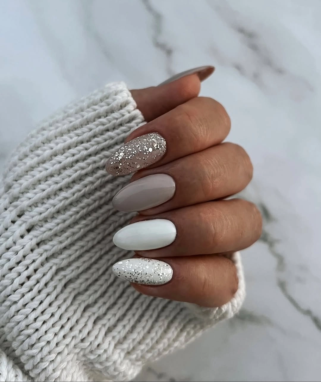 Long oval white gray nails with silver glitter
