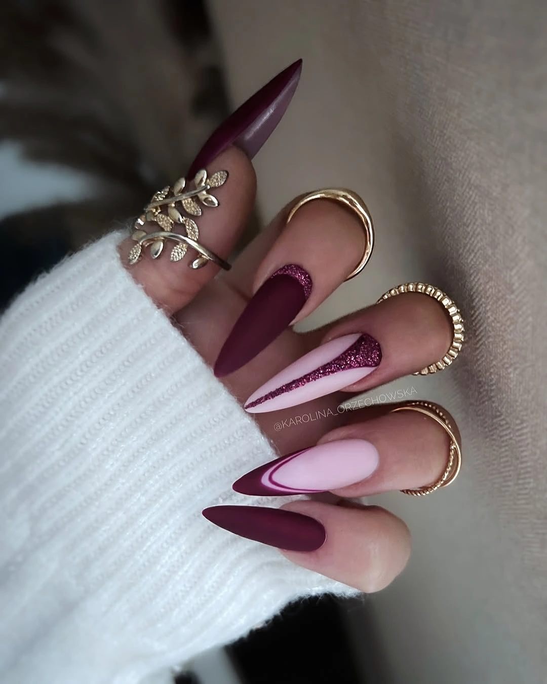 Long stiletto burgundy blush nails with glitter stripe