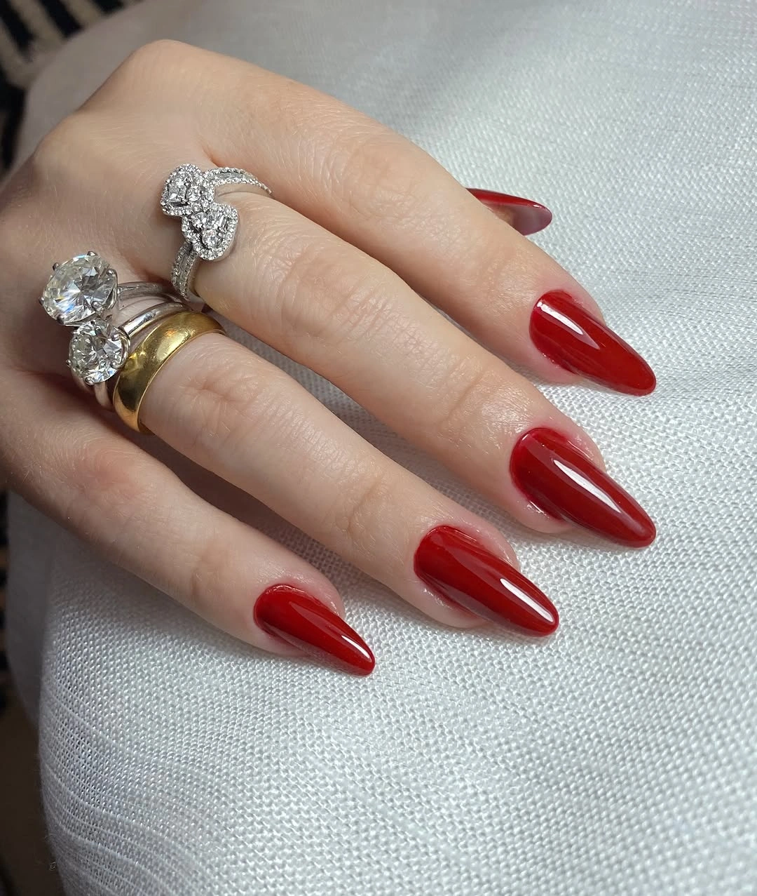 Long glossy red almond nails