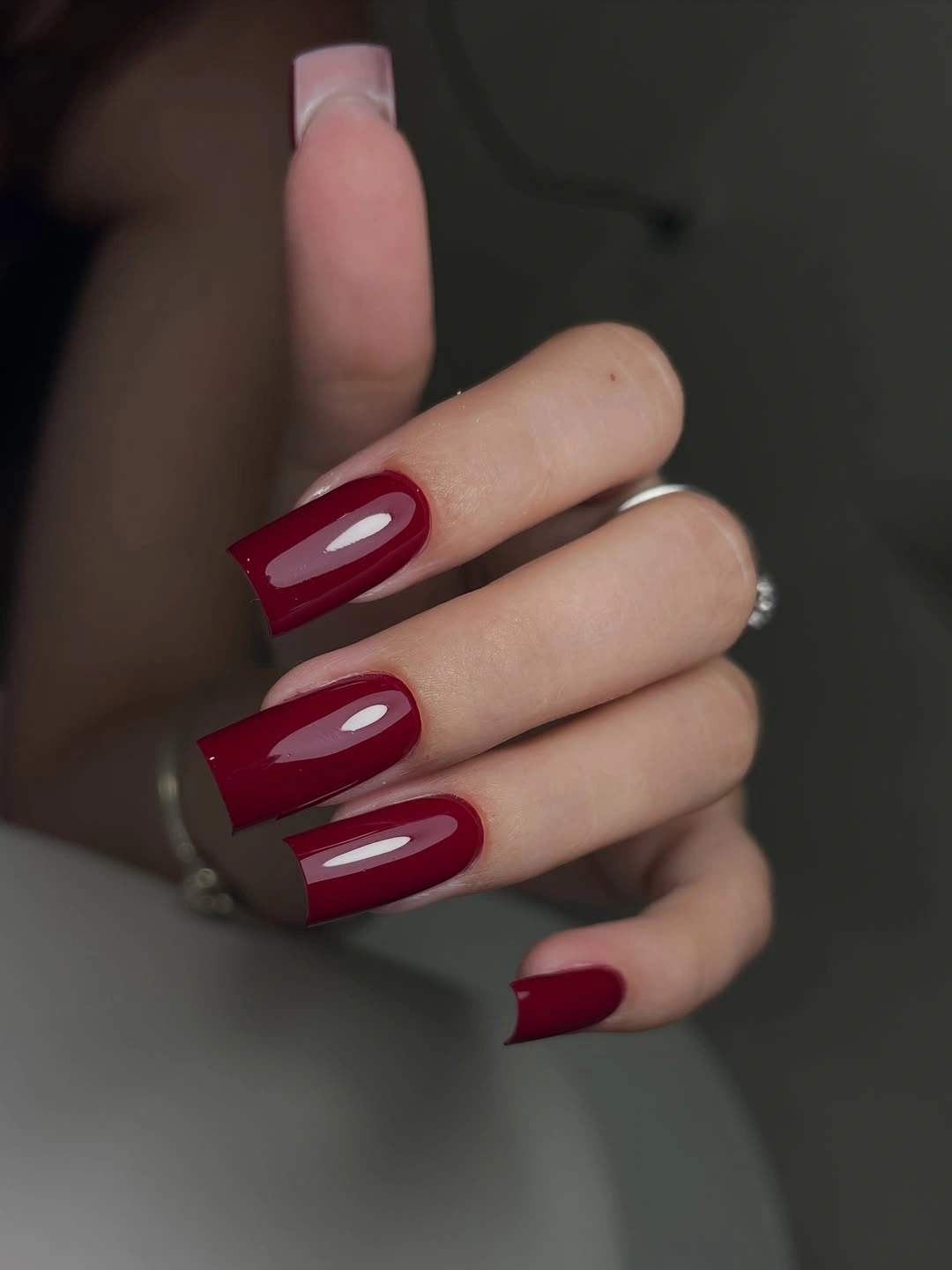 long square burgundy nails with sheer negative space blocks
