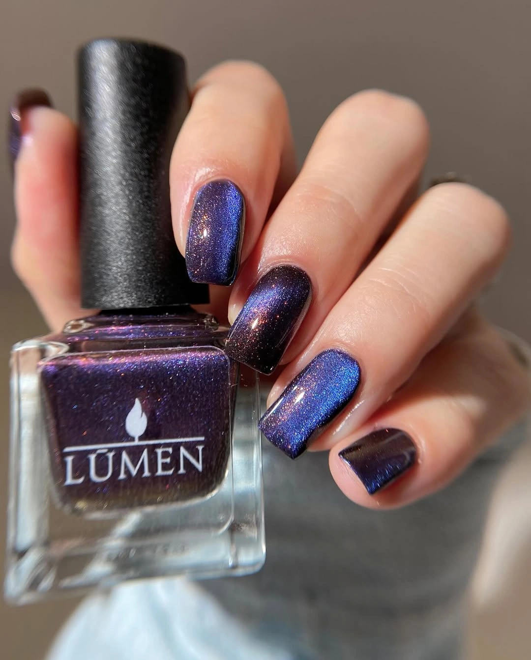 navy violet shimmer on medium oval nails