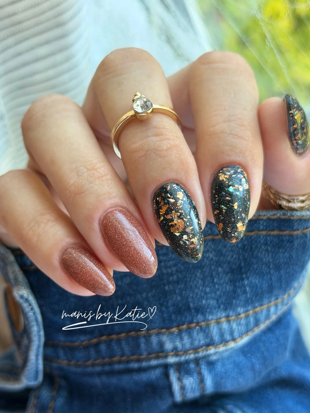 Dusty rose almond nails with deep teal glitter and gold accents