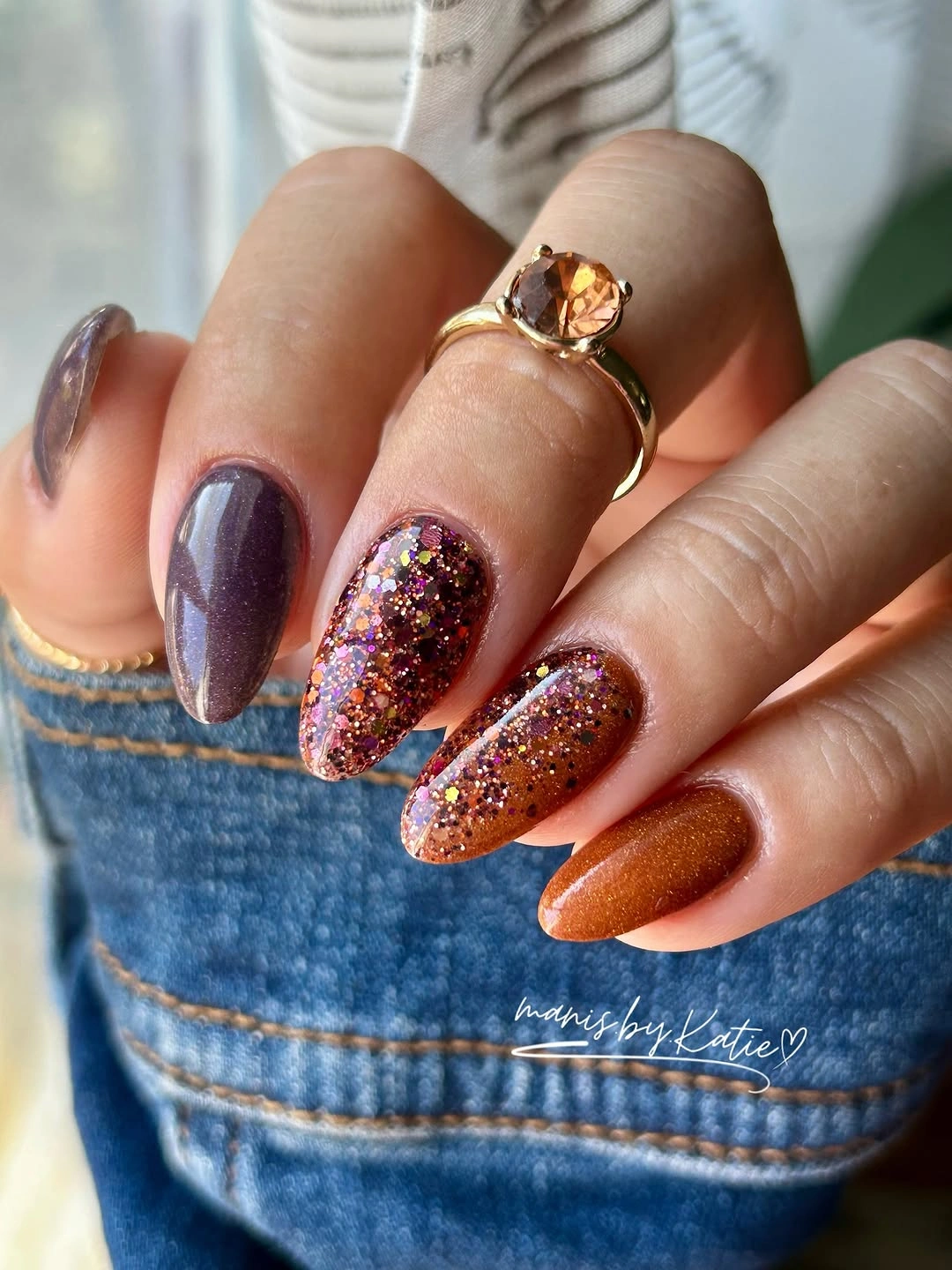 Almond nails in plum copper glitter and warm orange autumn shades