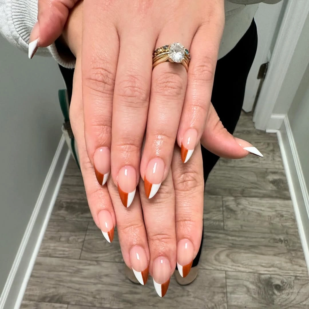 Long almond nails with white tips and deep outlined French edges