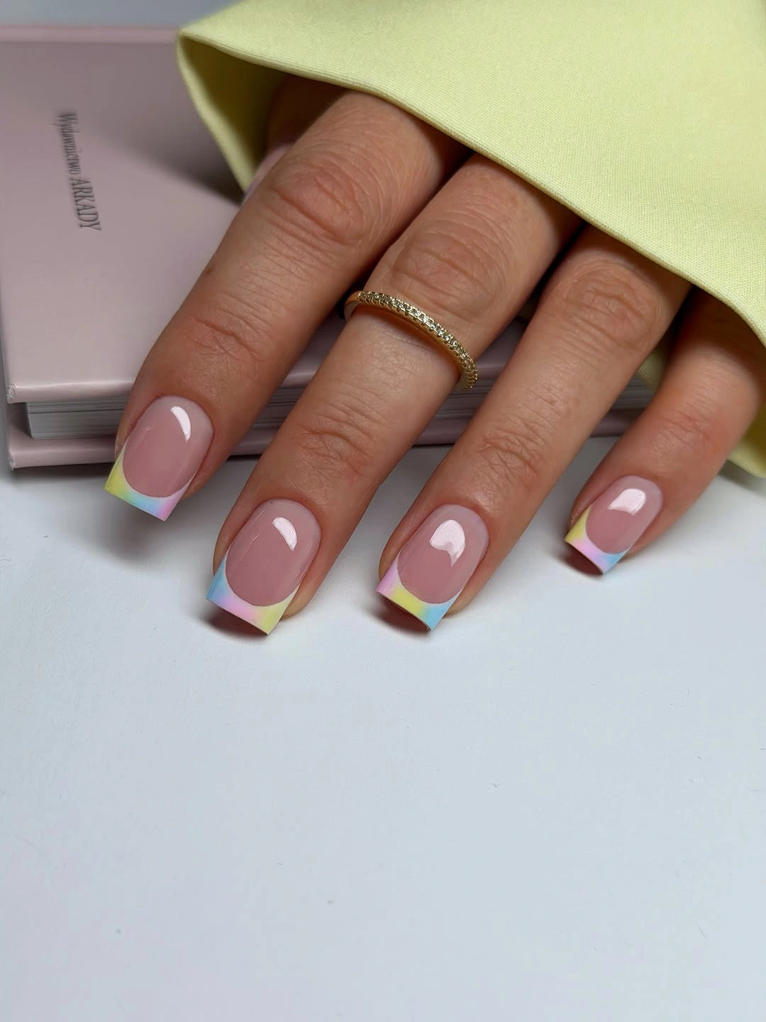 Medium square nude nails with lavender yellow and blue tip blocks