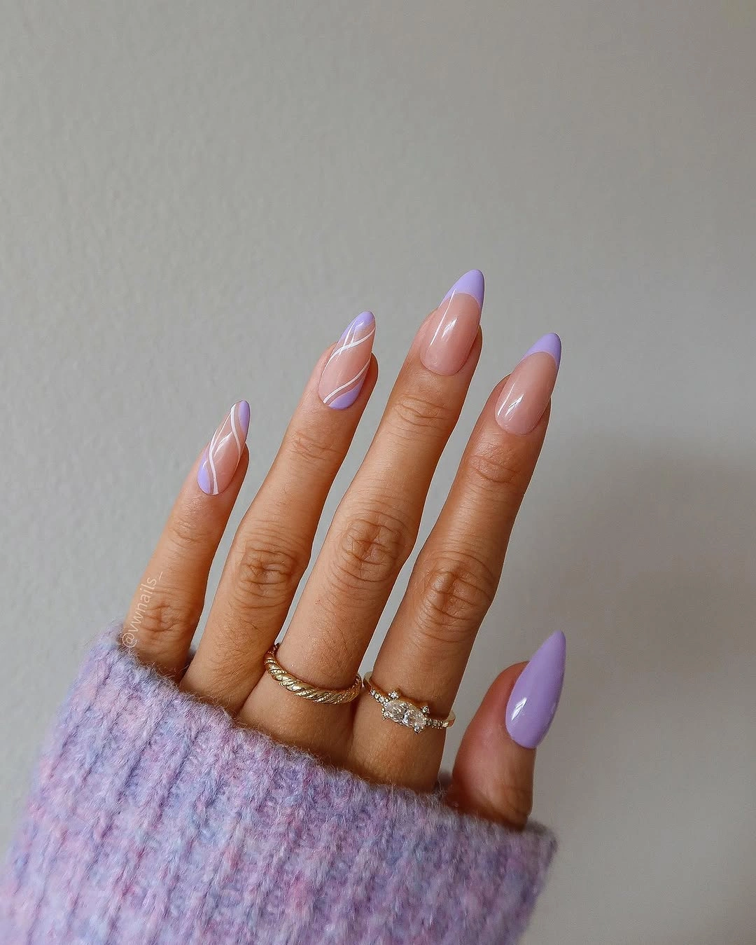Long almond pink nails with soft lavender French accents