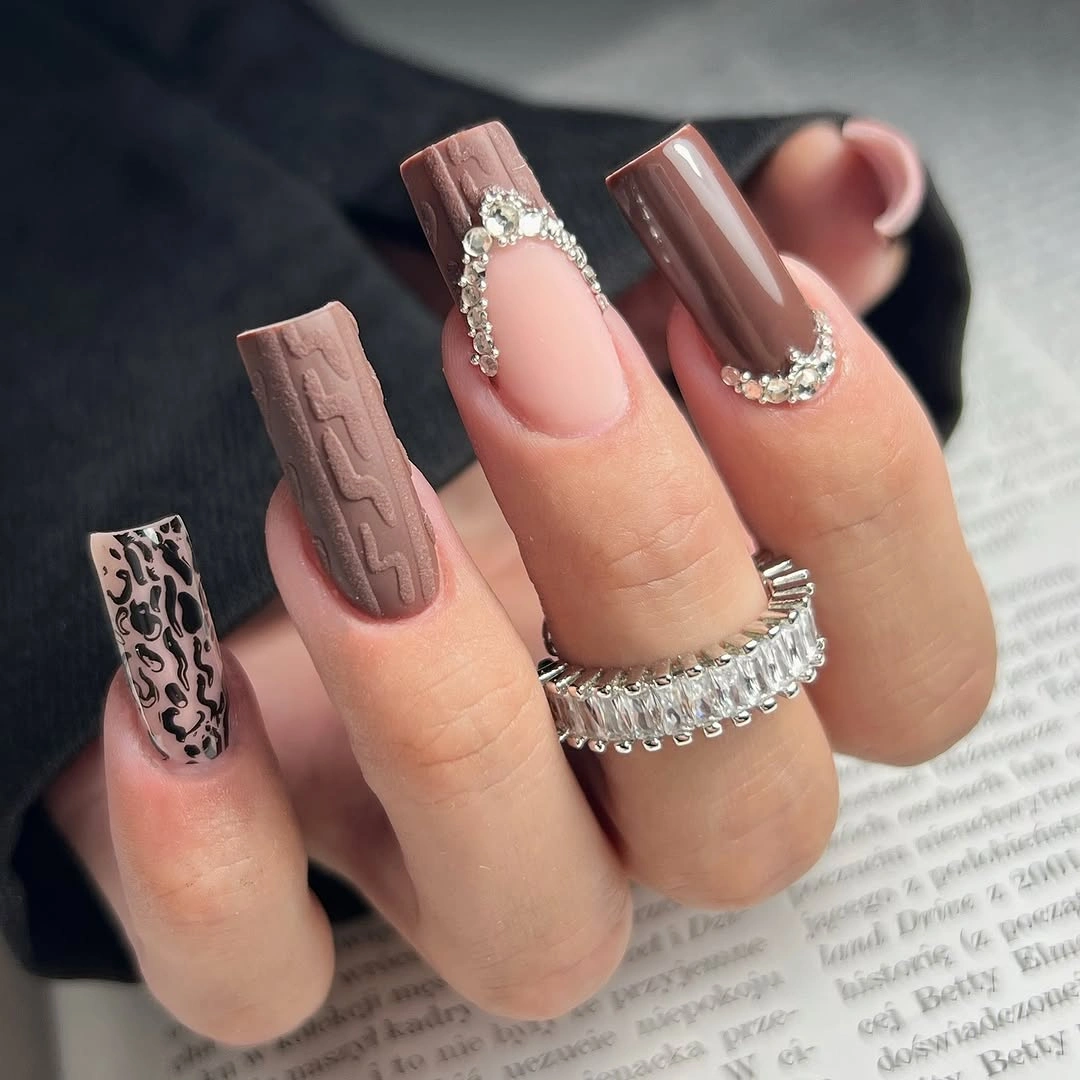 Taupe square nails with leopard ribbed and metallic accents