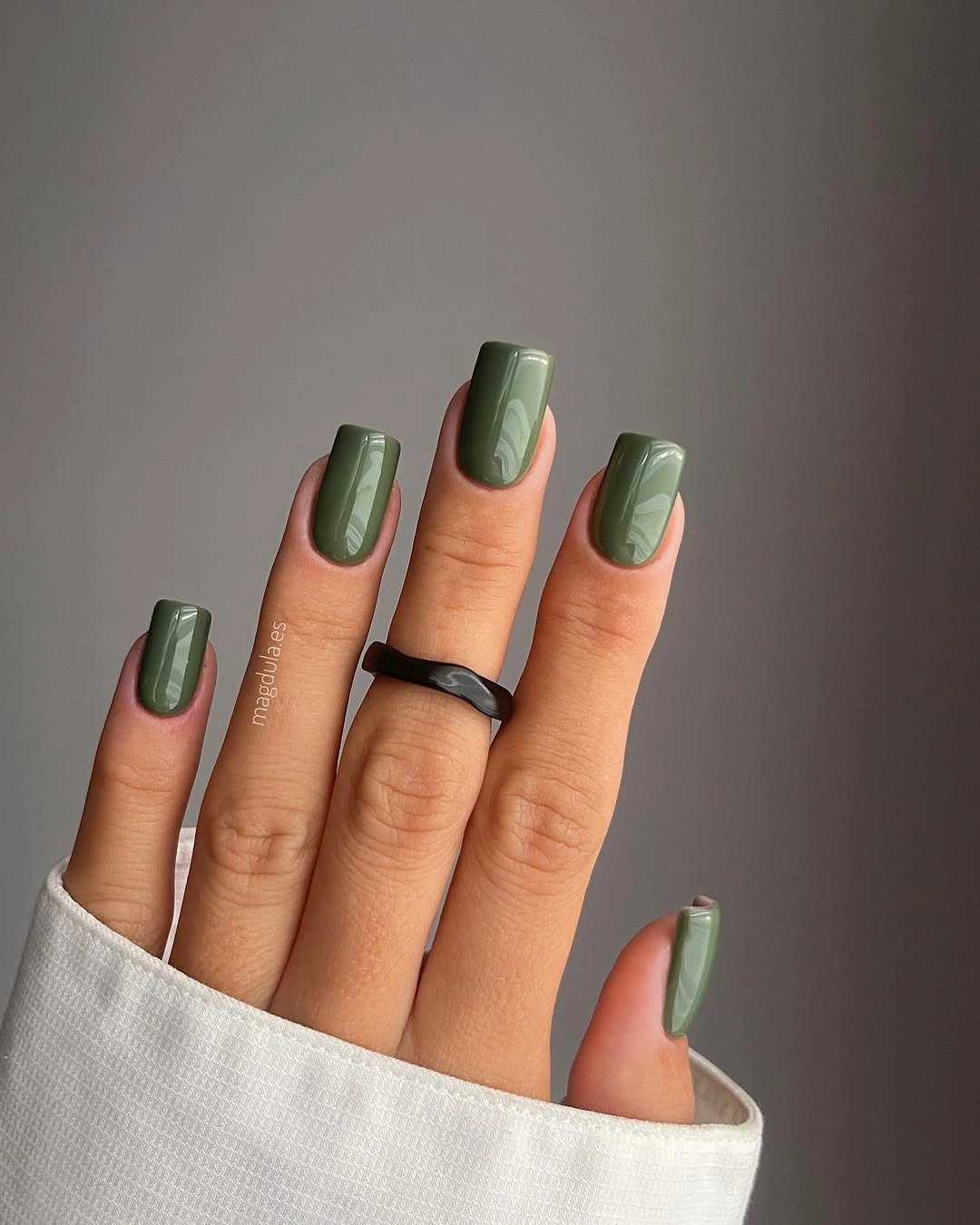 Muted sage square nails in one glossy solid color