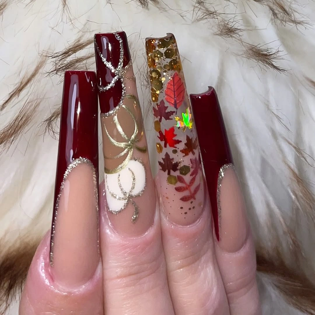 Long almond nails in a uniform glossy muted mauve pink shade