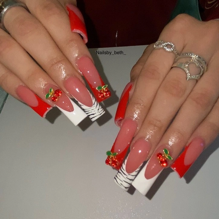 Medium square neon red nails with one nude leopard accent nail