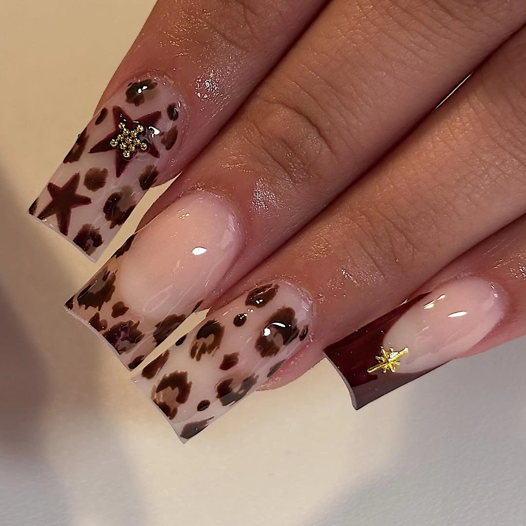 Leopard square nails with burgundy tips and stars