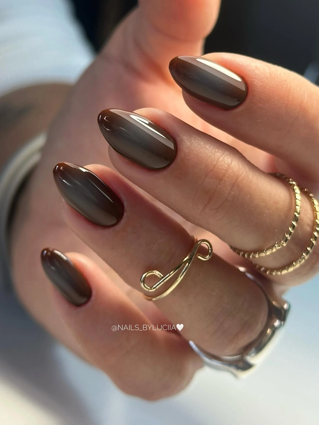 Glossy chocolate and charcoal oval fall nails