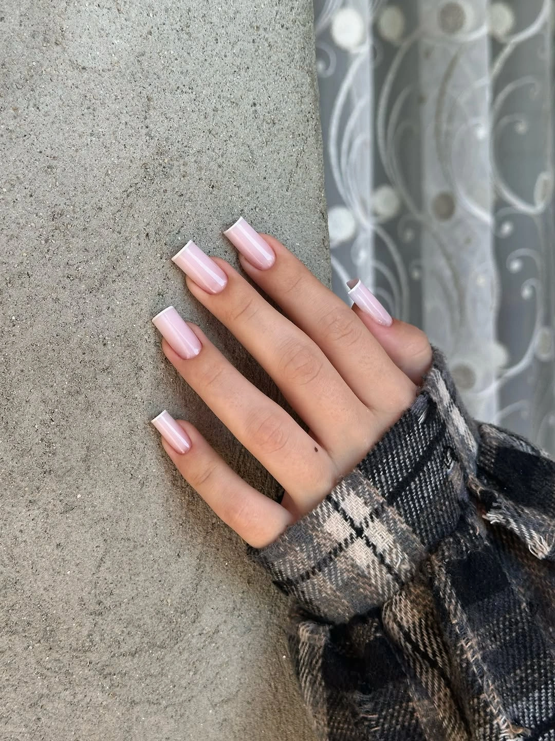 Long square nails in a clean glossy pale pink shade