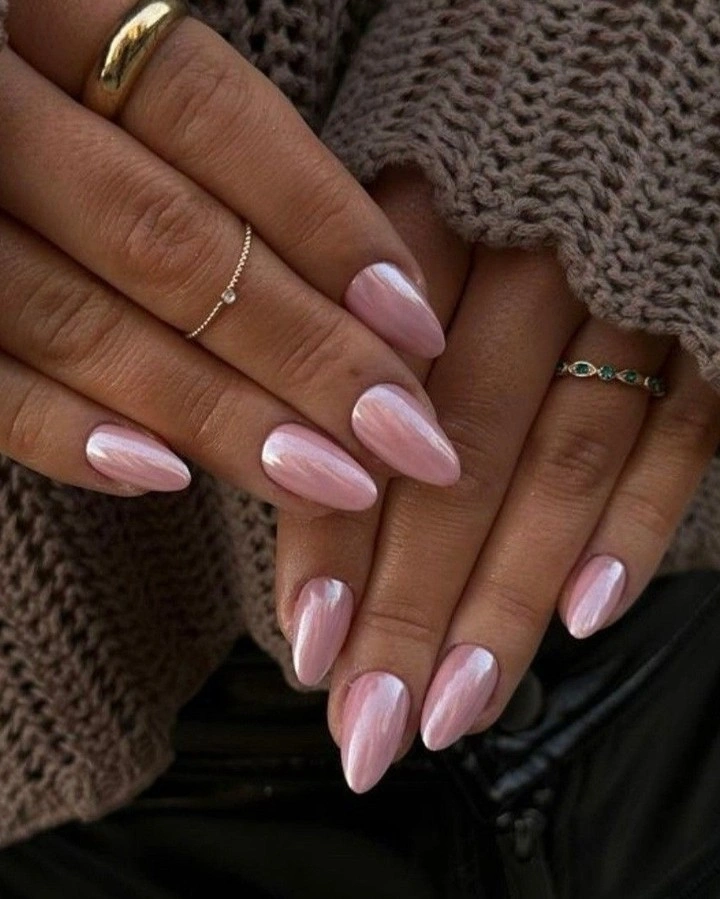 Long almond nails in a simple glossy pale pink finish