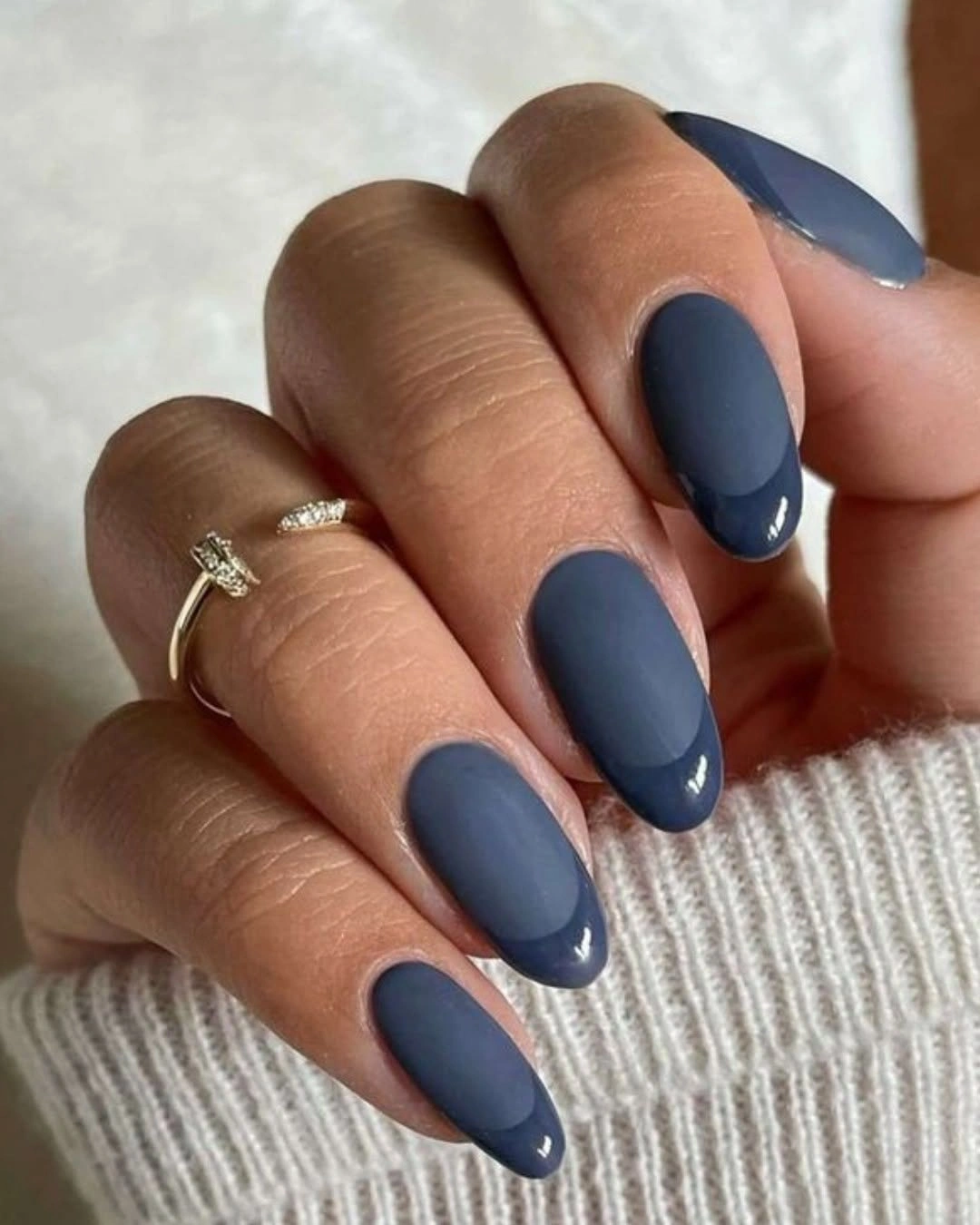 Long matte navy almond nails with subtle lighter edge details