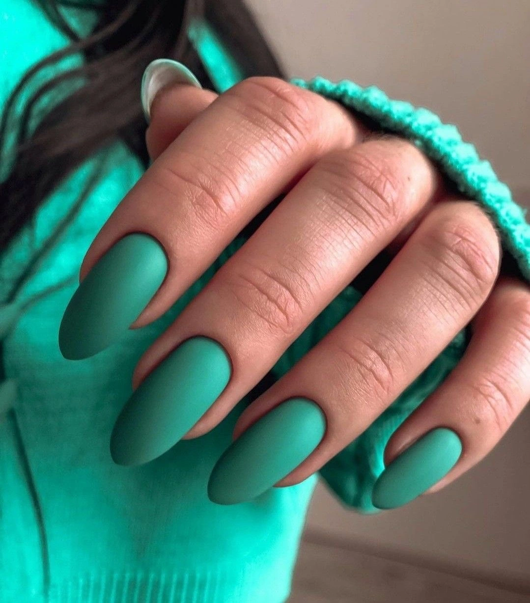 Long deep teal matte almond nails in one saturated shade