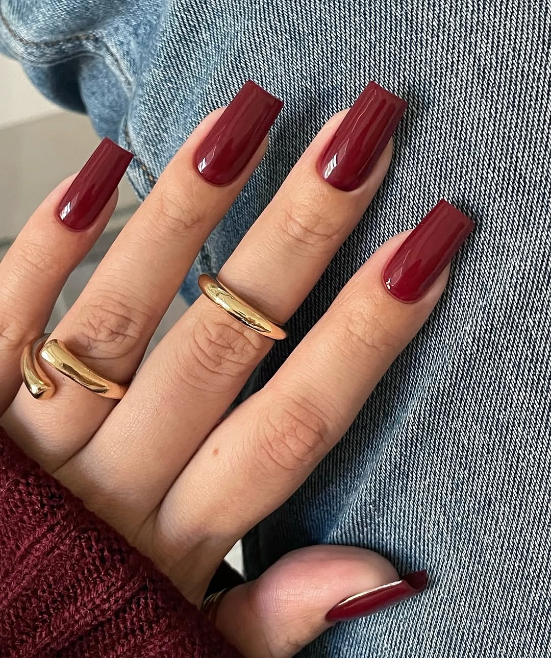 Glossy burgundy nails on a medium soft square shape
