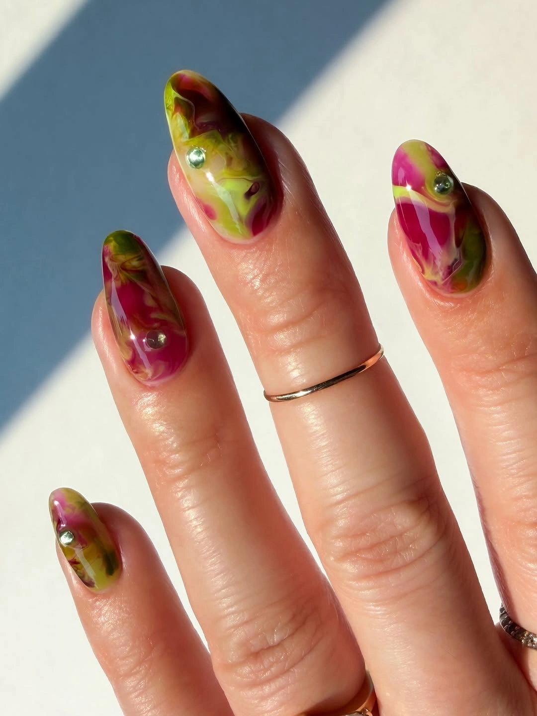 Berry olive and pink swirled almond nails
