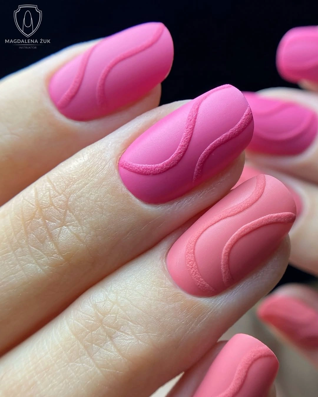 Matte pink oval nails with raised waves