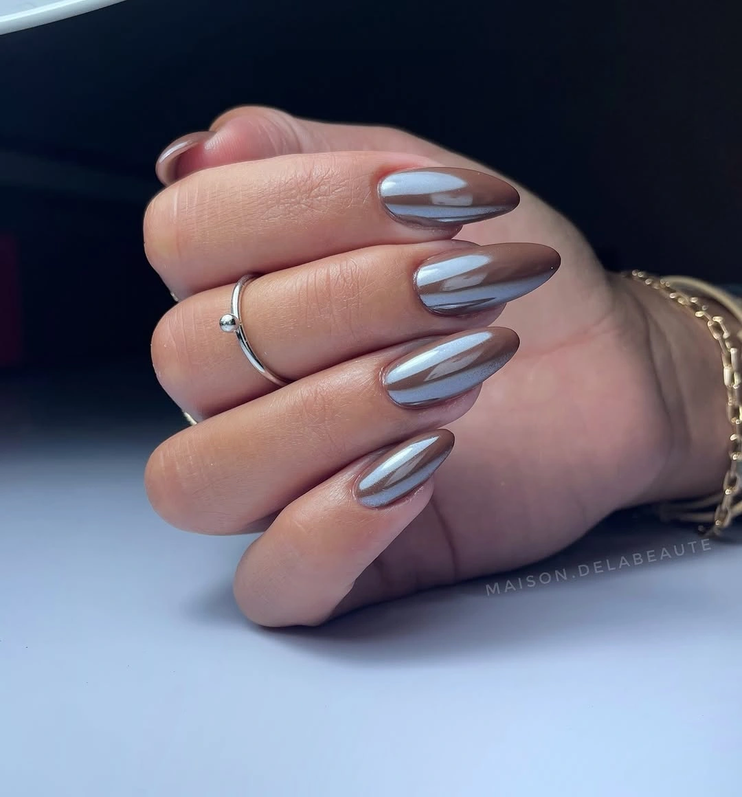 Smoky brown almond nails with reflective centers