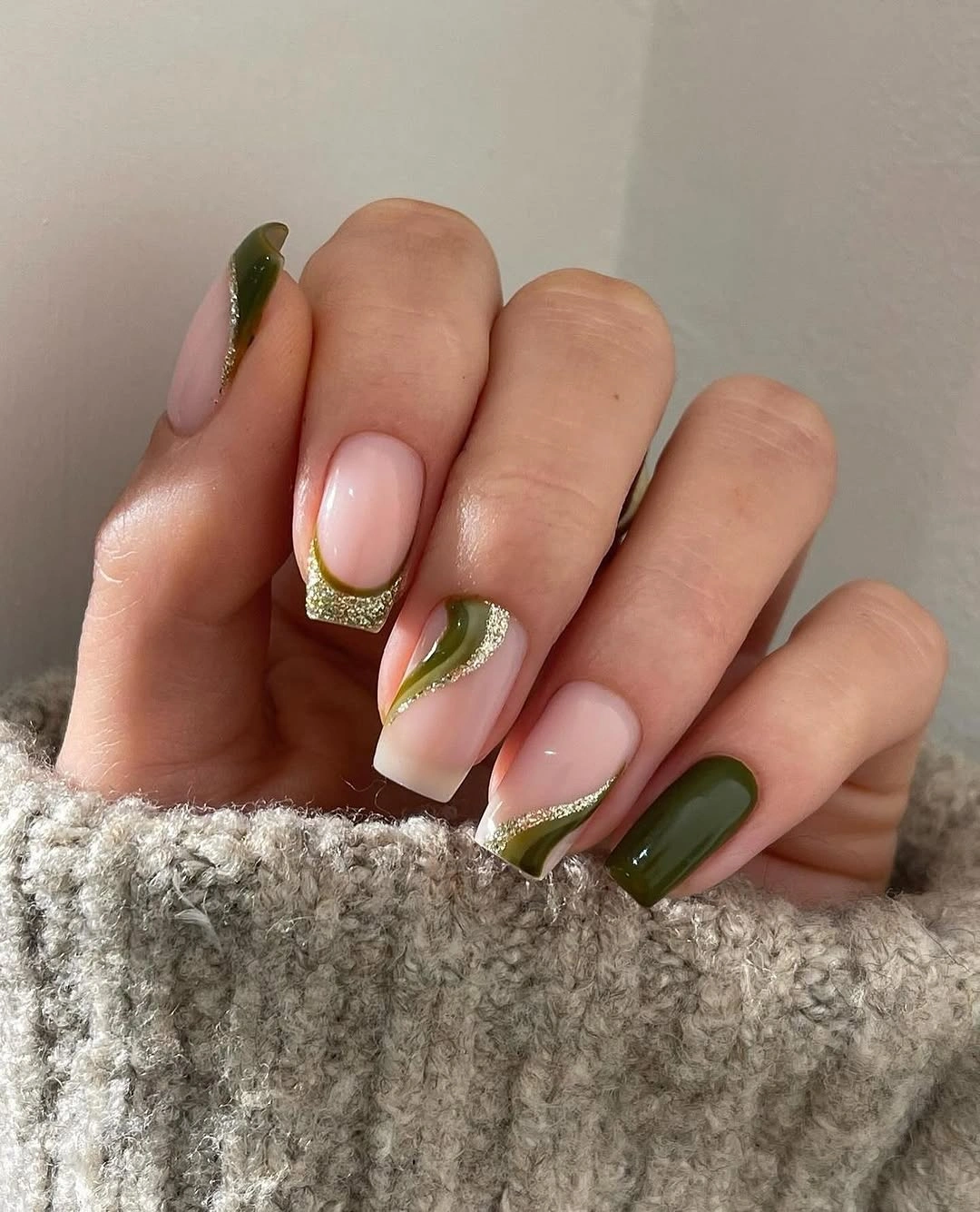Olive green square nails with gold glitter curves