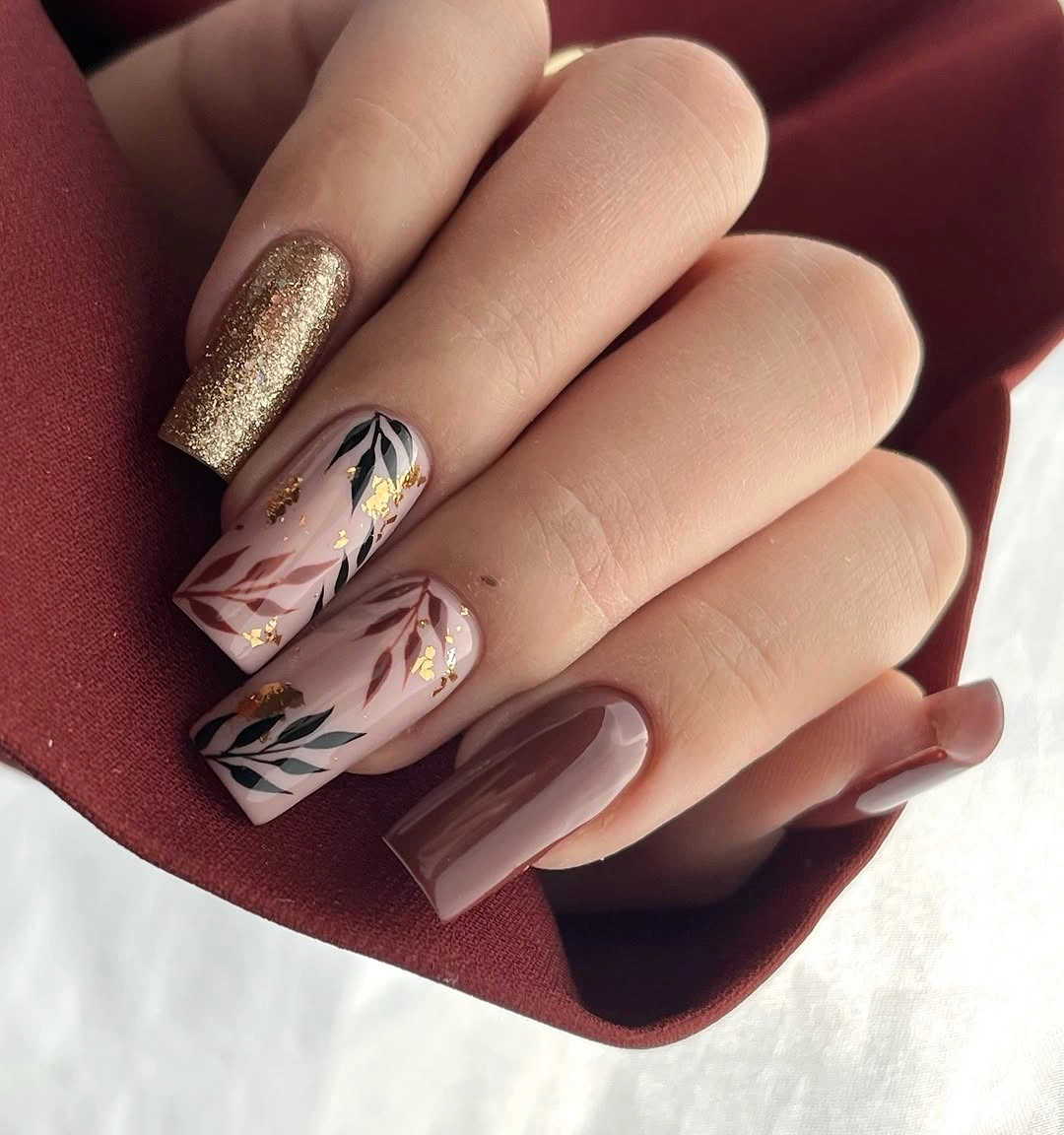 Squared fall nails with glitter and botanical accents