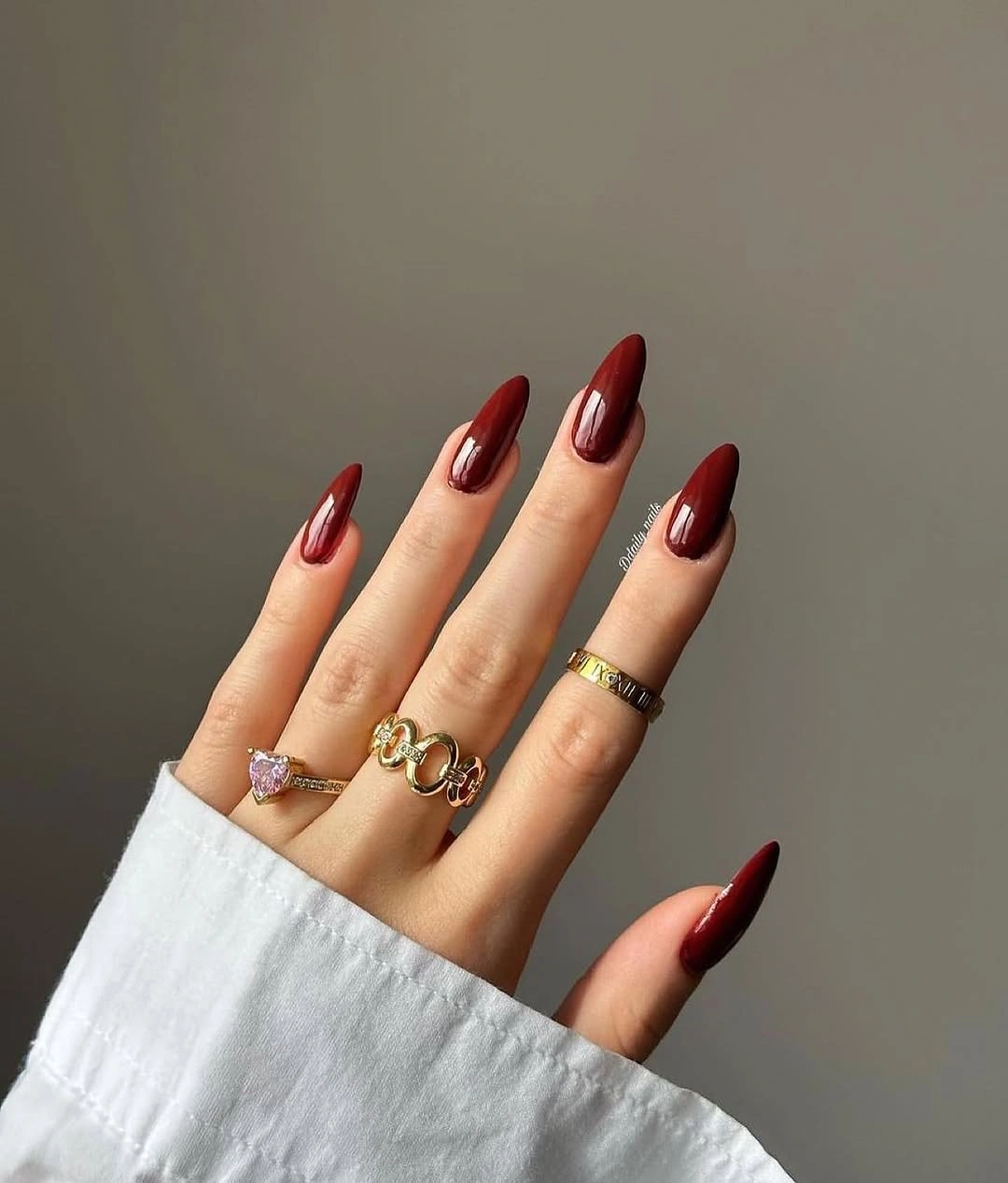 Glossy wine red almond nails