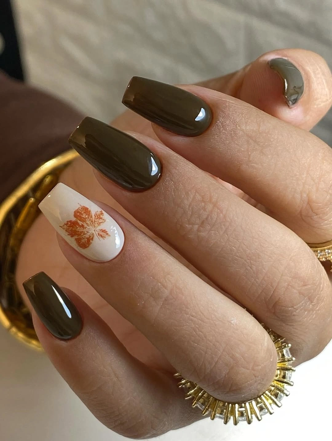 Medium square espresso nails with pale floral accent details