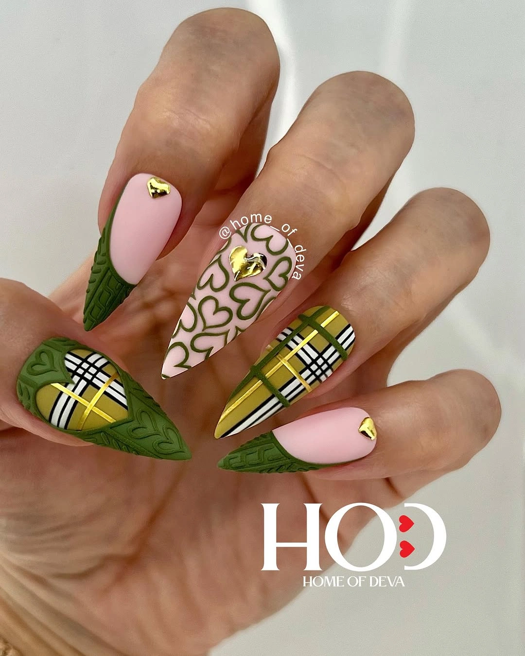 Long square nails with olive green plaid and pink panels