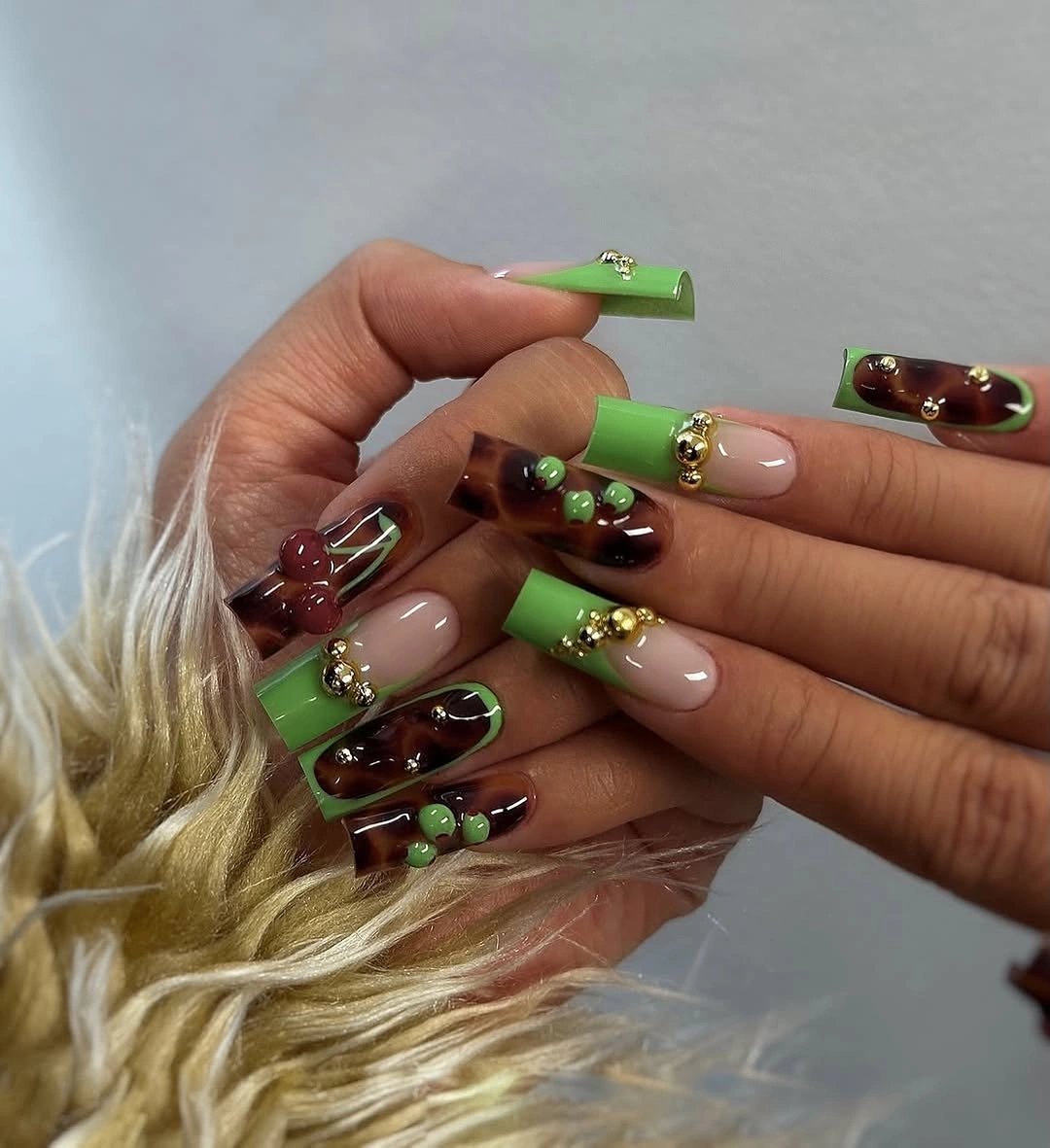 Green tortoise square nails with bead accents