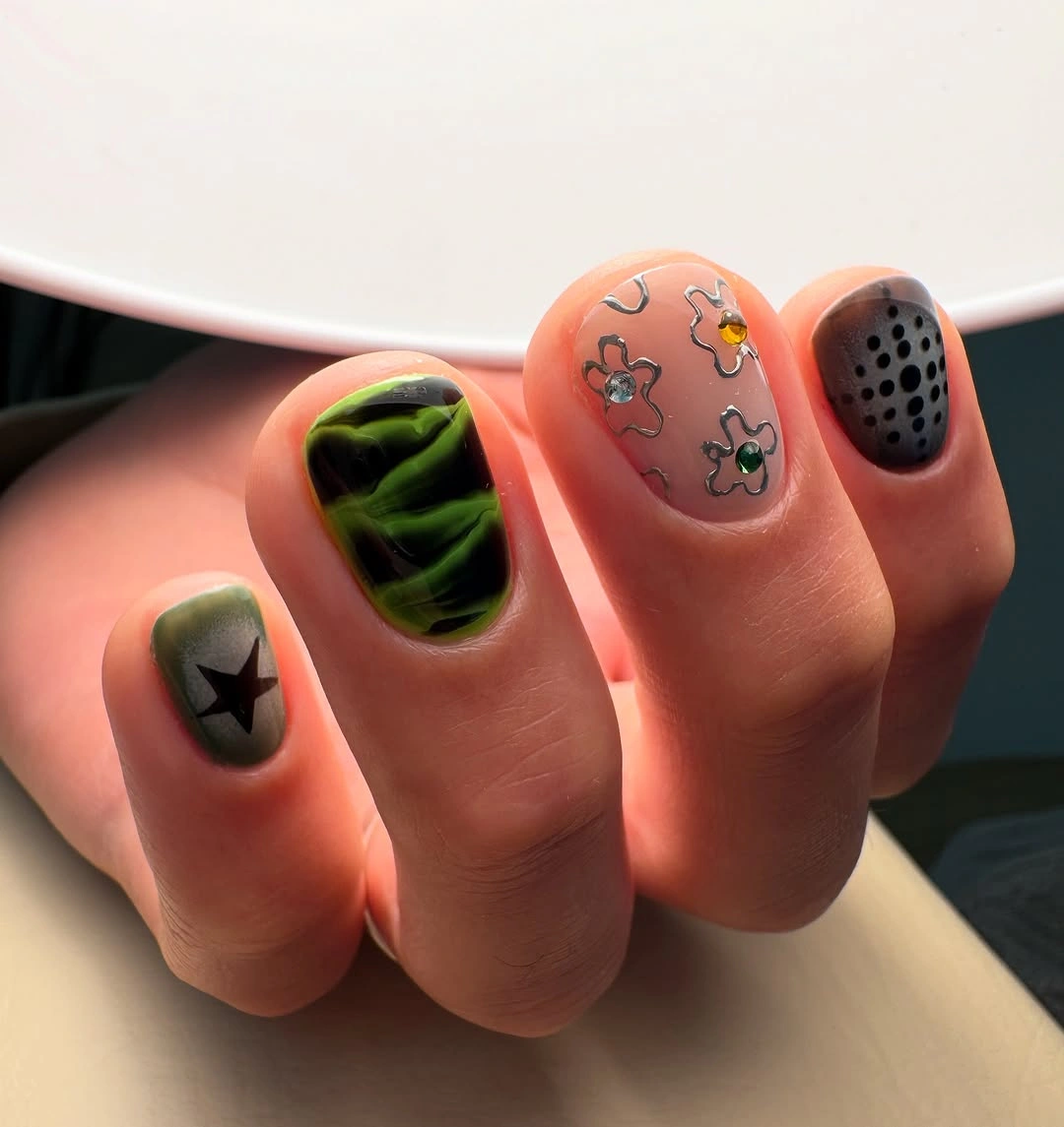 Short olive nails with star and mixed accents