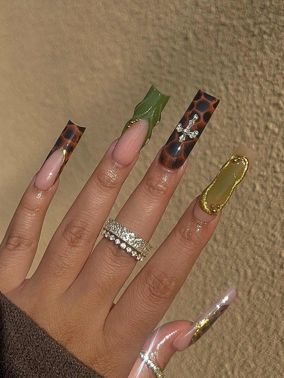 Flared tortoise square nails with olive gold edges