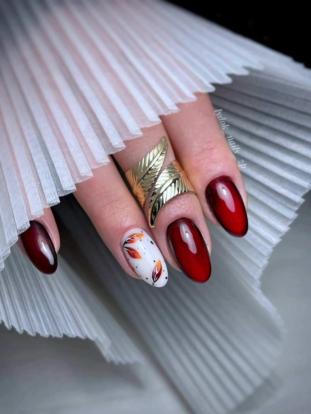 burgundy red almond nails with illustrations