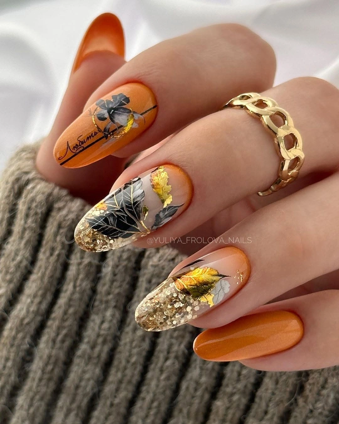 orange yellow pointed nails with floral panels
