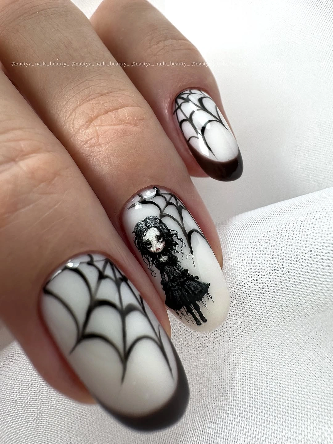 white almond nails with black web lines