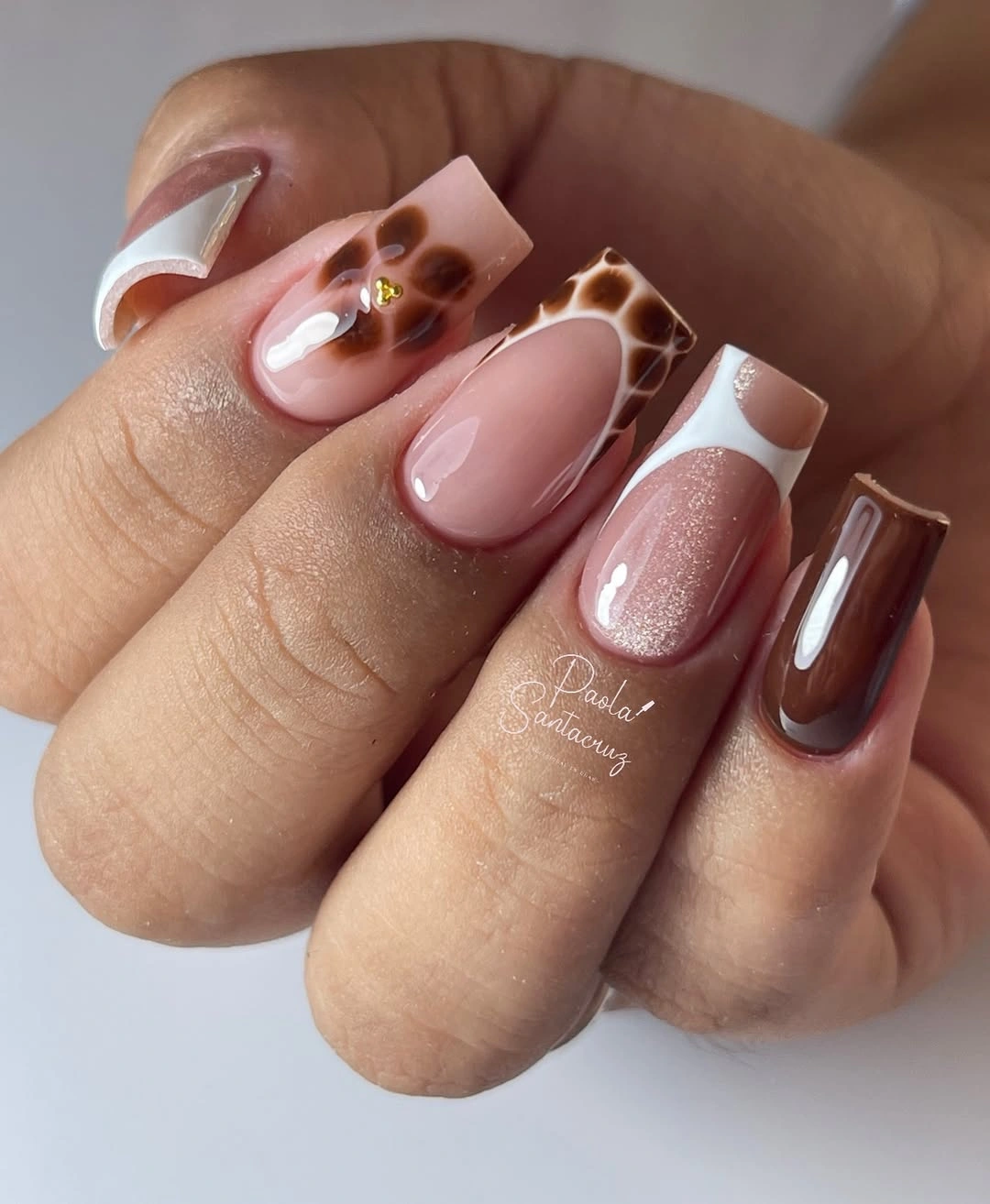 nude almond nails with layered brown tips
