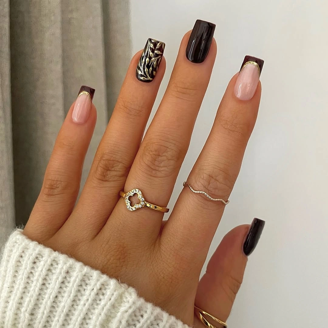 Short square nails with chocolate tips and gold accent