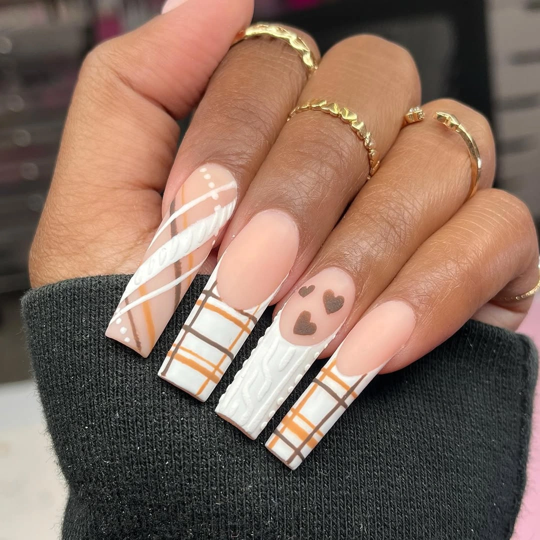 Long square office nails with cream orange black plaid panels