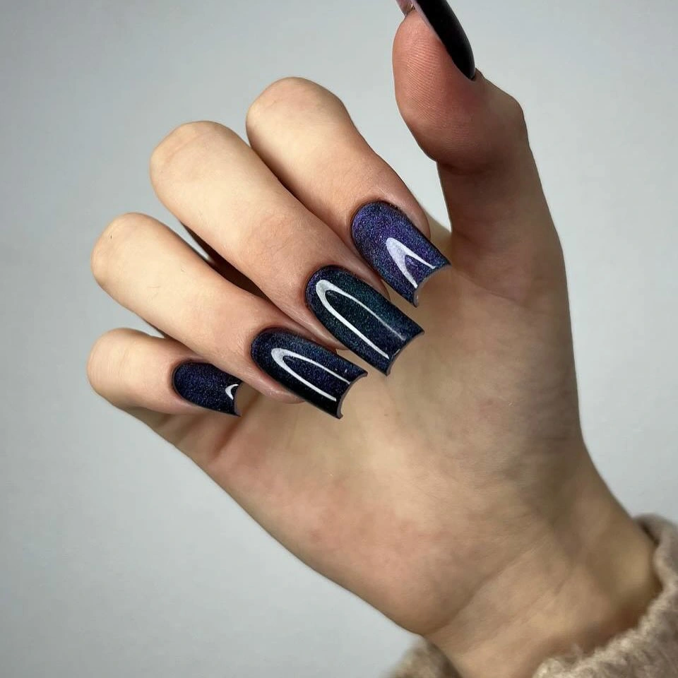 Deep blue square nails with thin silver line accents
