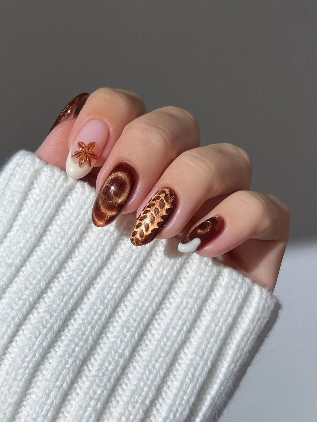 Long coffin brown burgundy and cream nails with tortoiseshell floral texture