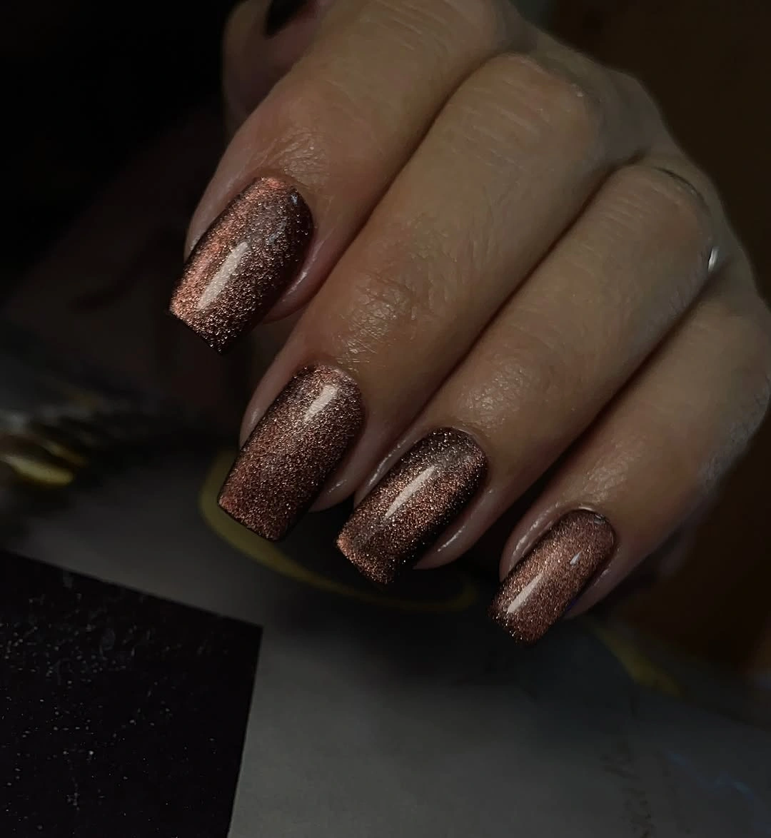 Short square nails with deep brown fine shimmer