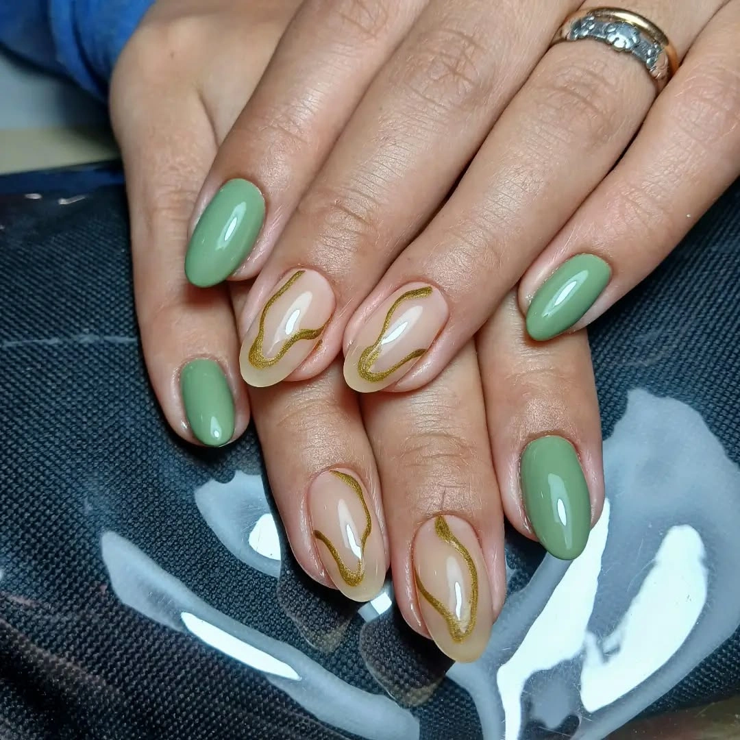 Mint green nails with gold organic line accents