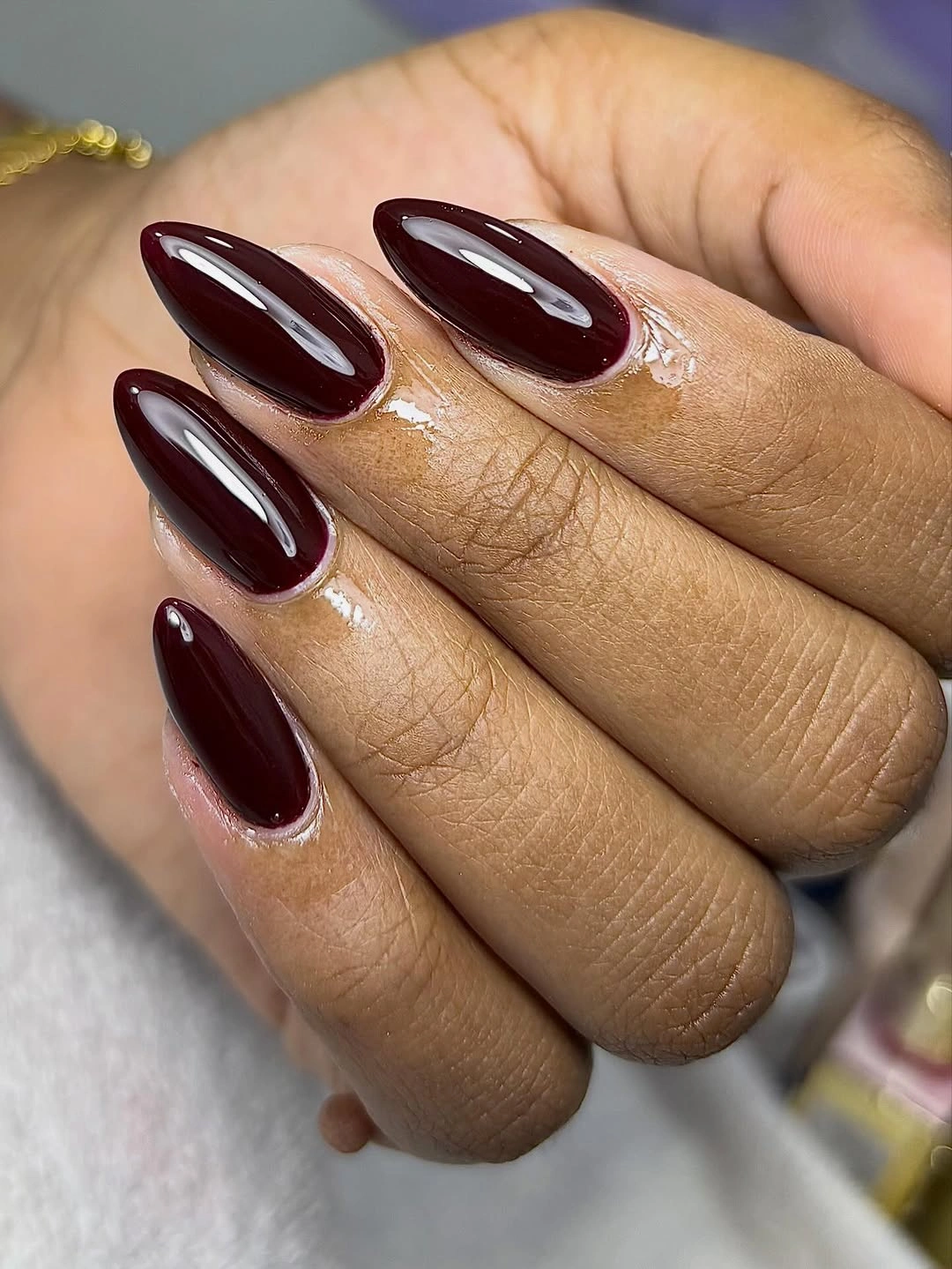 long glossy deep burgundy almond nails